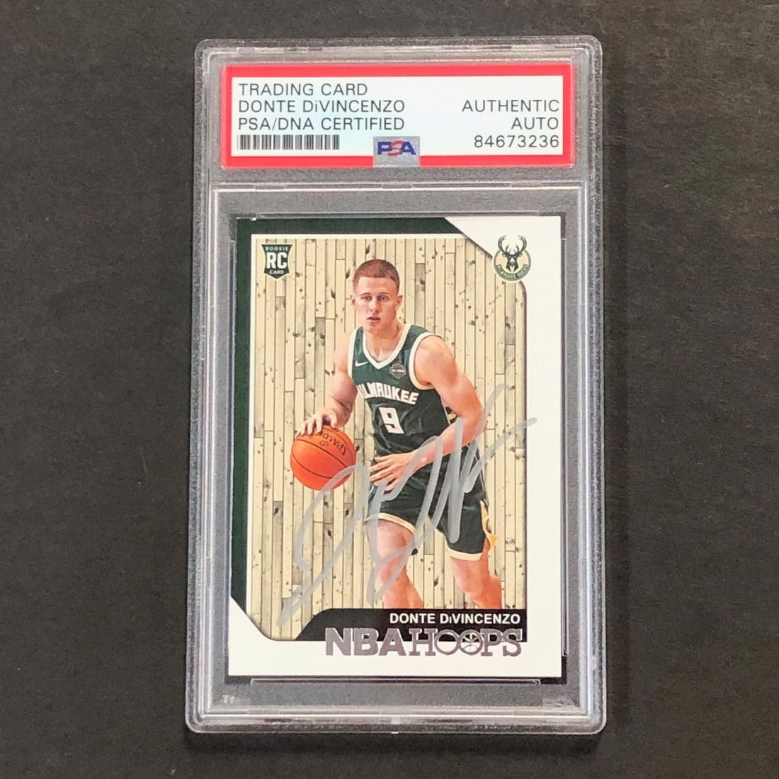 PSA DNA Slabbed Donte DiVincenzo 2018-19 NBA Hoops Rookie Auto #246: PSA DNA Slabbed Donte DiVincenzo 2018-19 NBA Hoops Rookie Auto #246 This is a 2018-19 NBA Hoops #246 rookie card featuring Donte DiVincenzo of the Milwaukee Bucks. The card is hand-signed by Donte DiV