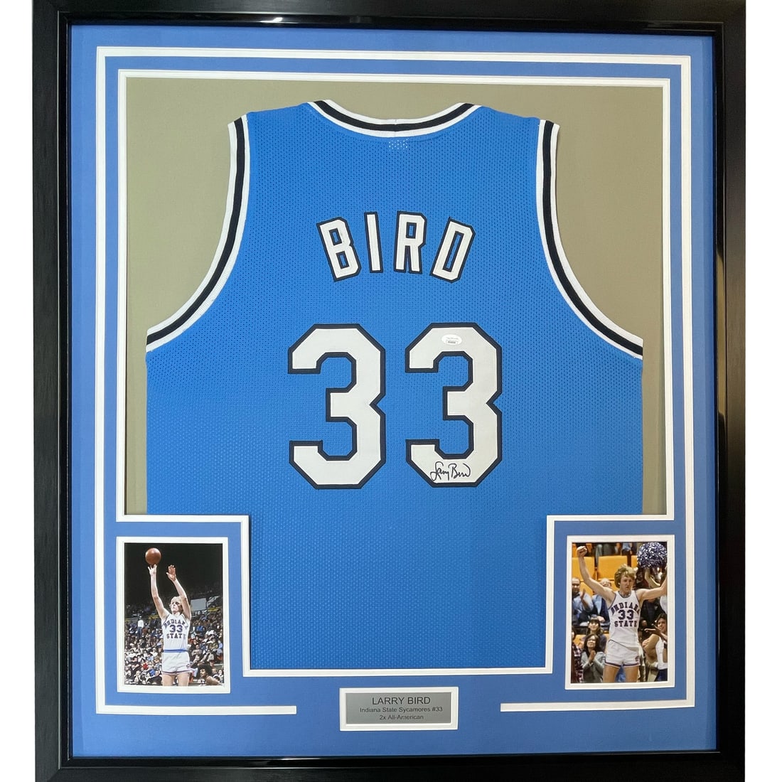 Larry Bird signed Indiana State jersey framed with JSA COA: Larry Bird signed Indiana State jersey framed with JSA COA This professionally framed and matted display features a blue Indiana State Sycamores jersey autographed by Larry Bird. The jersey comes auth