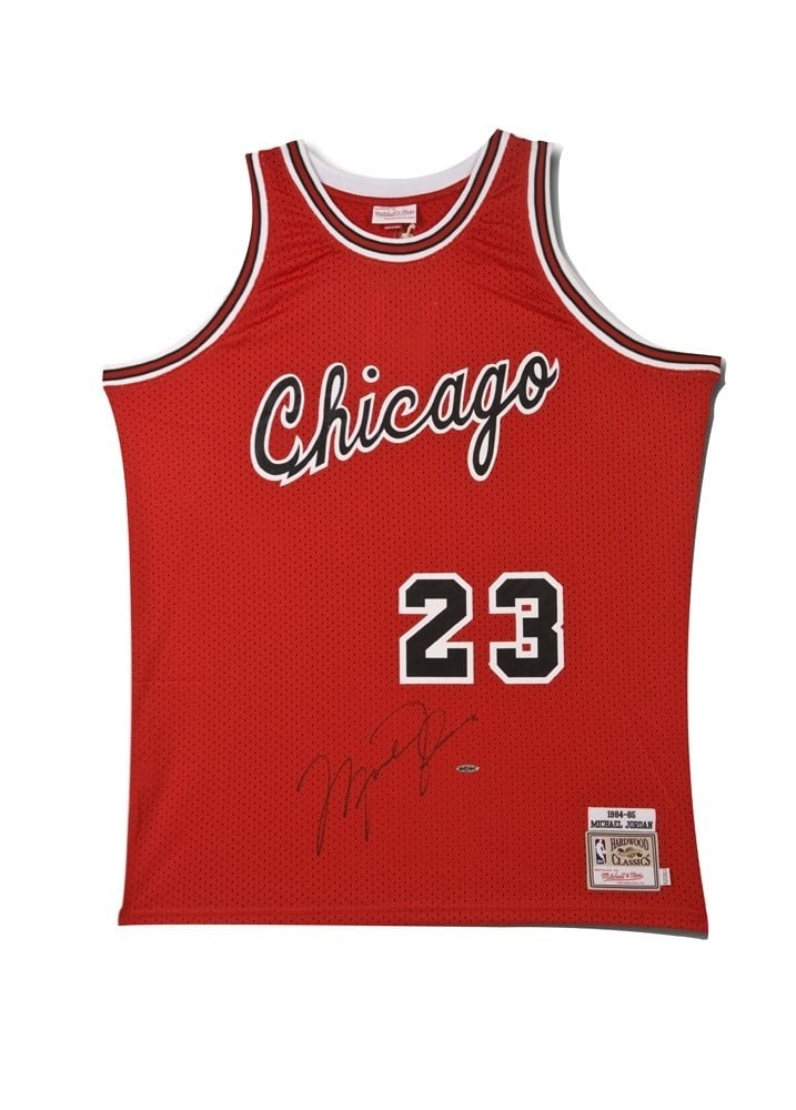 Chicago Bulls 1984-85 Michael Jordan Signed Mitchell & Ness Jersey Upper Deck Authenticated: Chicago Bulls 1984-85 Michael Jordan Signed Mitchell & Ness Jersey Upper Deck Authenticated This is an original Chicago Bulls red jersey from the 1984-85 season, autographed by Michael Jordan. The jer
