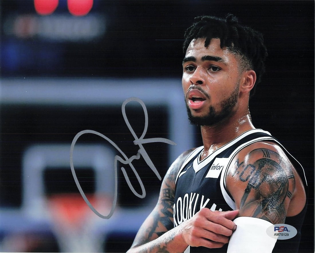 D'Angelo Russell Autographed 8x10 Photo PSA/DNA Brooklyn Nets: D'Angelo Russell Autographed 8x10 Photo PSA/DNA Brooklyn Nets This professionally printed 8x10 photo features the autograph of D'Angelo Russell, the talented basketball player known for his time with 