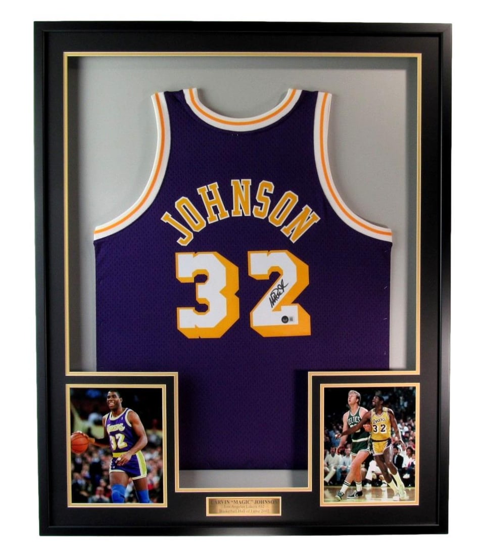 Framed Lakers jersey signed by Earvin Magic Johnson Beckett HOF: Framed Lakers jersey signed by Earvin Magic Johnson Beckett HOF This is a framed Los Angeles Lakers jersey autographed by Earvin "Magic" Johnson, a Hall of Fame basketball player. The jersey is an ori