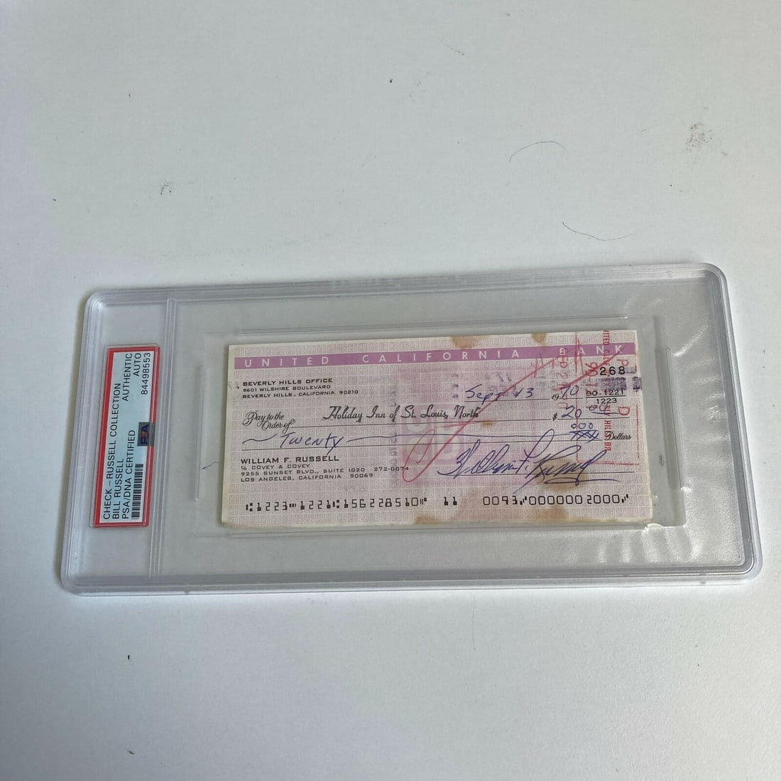 Bill Russell Autographed Bank Check PSA DNA Boston Celtics HOF: Bill Russell Autographed Bank Check PSA DNA Boston Celtics HOF This is a rare autographed bank check signed by Bill Russell, a legendary player of the Boston Celtics and a Hall of Famer. The check fea