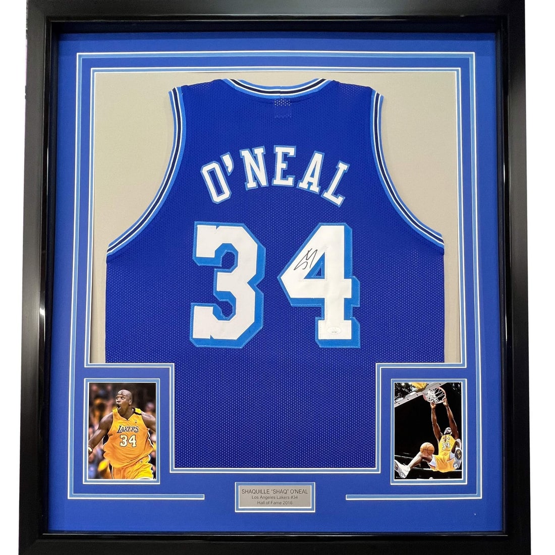 Framed Shaquille O Neal Signed LA Lakers Blue Jersey JSA COA 33x42: Framed Shaquille O Neal Signed LA Lakers Blue Jersey JSA COA 33x42 This framed Los Angeles Lakers blue jersey features the authentic signature of Shaquille O'Neal. The autograph has been verified by J