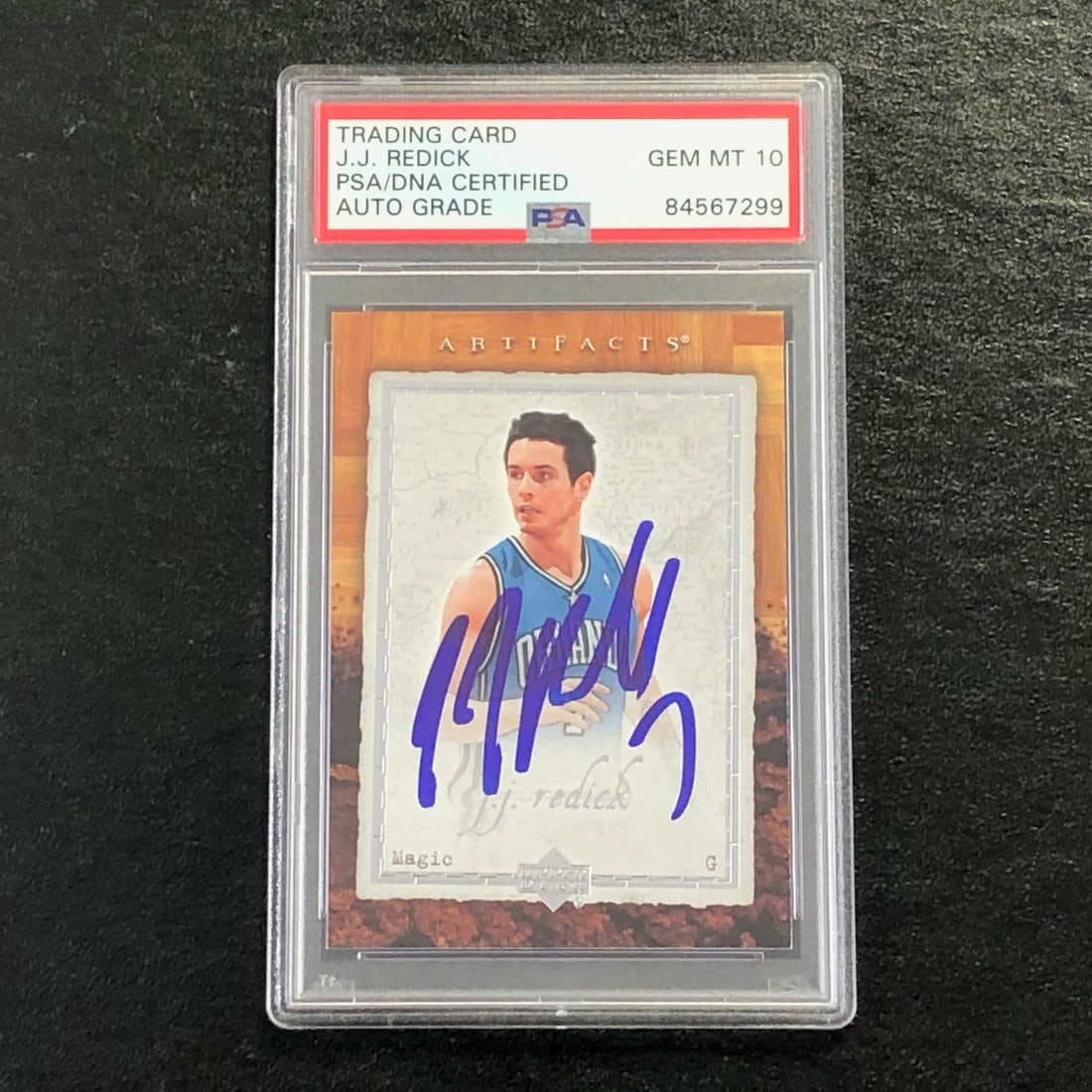 2007-08 J.J. Redick Signed Basketball Card AUTO 10 PSA Slabbed: 2007-08 J.J. Redick Signed Basketball Card AUTO 10 PSA Slabbed This is a 2007-08 Artifacts Basketball trading card featuring J.J. Redick, who played for the Orlando Magic. The card is signed by Redick
