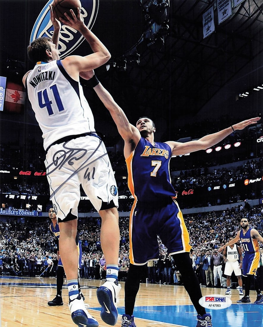 Dirk Nowitzki Autographed 8x10 Photo PSA/DNA Dallas Mavericks: Dirk Nowitzki Autographed 8x10 Photo PSA/DNA Dallas Mavericks This is a professionally printed 8x10 photograph signed by Dirk Nowitzki, the legendary player of the Dallas Mavericks. The autograph has 