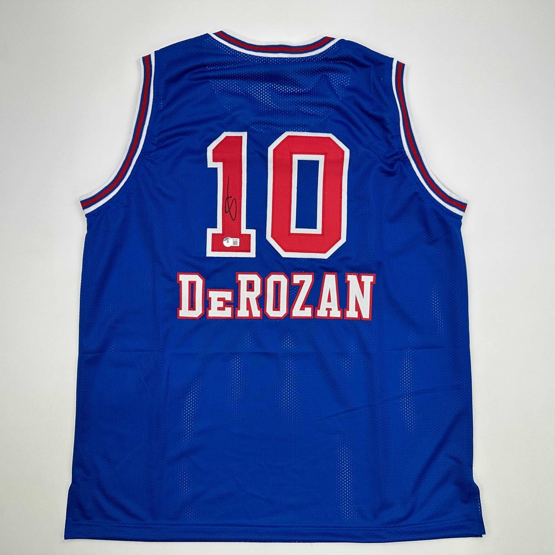 Signed DeMar DeRozan Sacramento Kings Blue Retro Jersey JSA COA: Signed DeMar DeRozan Sacramento Kings Blue Retro Jersey JSA COA Own a piece of basketball history with this autographed DeMar DeRozan Sacramento Kings Blue KC Retro Jersey. This original custom jersey