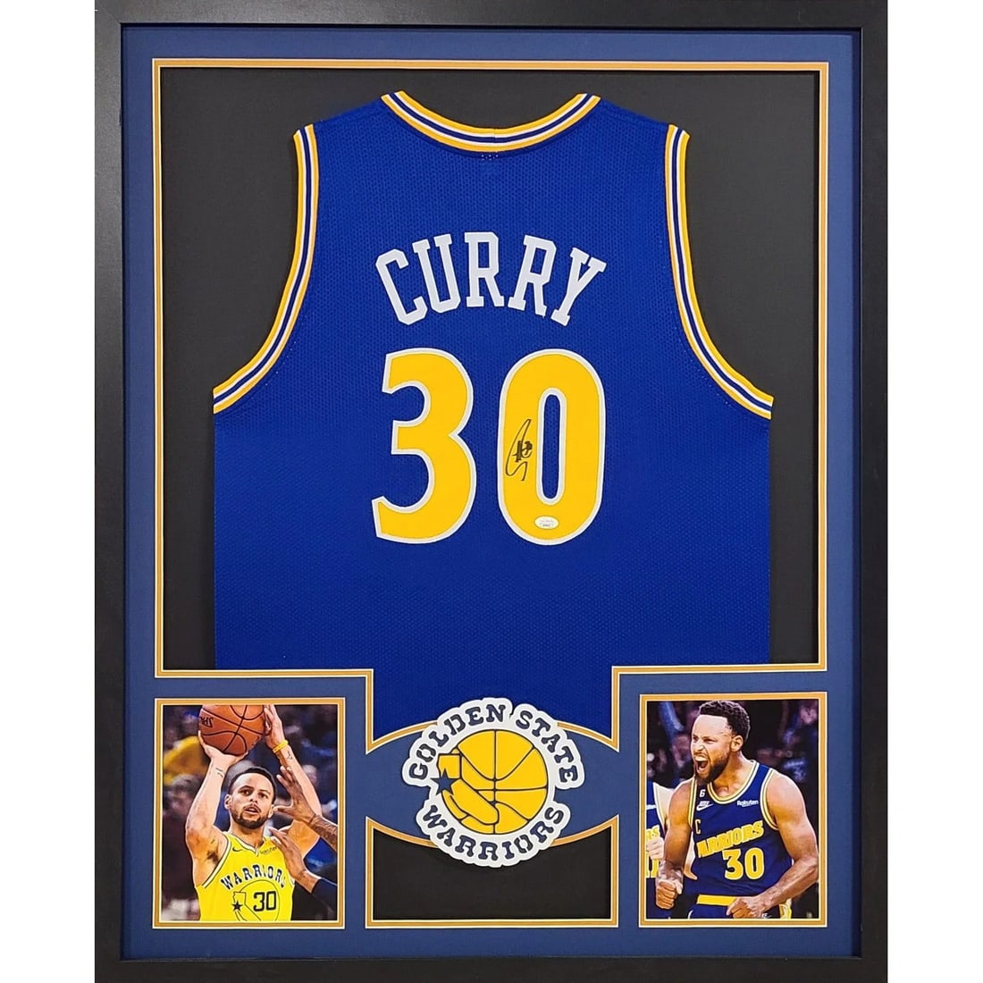 Framed Stephen Curry Autographed Warriors Jersey JSA: Framed Stephen Curry Autographed Warriors Jersey JSA This framed Stephen Curry jersey features an authentic autograph and is professionally presented with attention to detail, including a prominent te