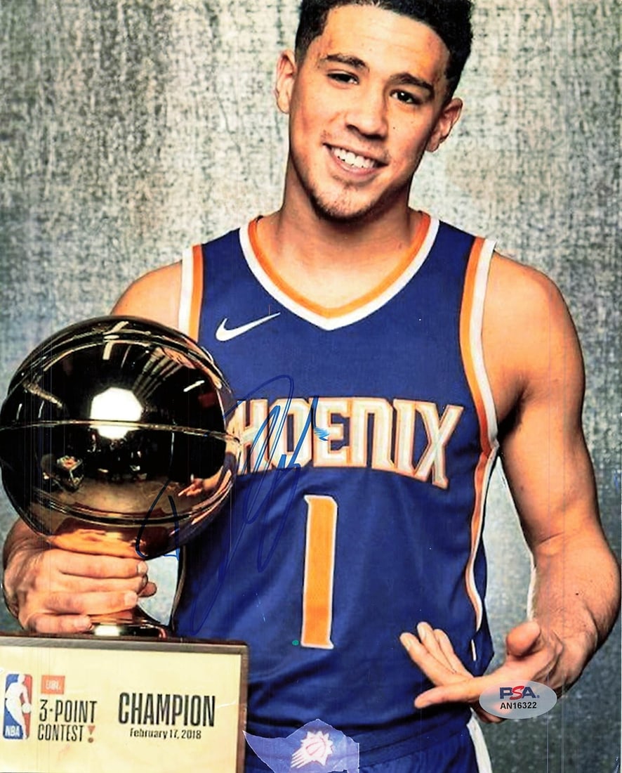 Devin Booker Autographed 8x10 Photo PSA/DNA Phoenix Suns Collectible: Devin Booker Autographed 8x10 Photo PSA/DNA Phoenix Suns Collectible This is a professionally printed 8x10 photograph featuring Devin Booker, star player of the Phoenix Suns. The photo is autographed 