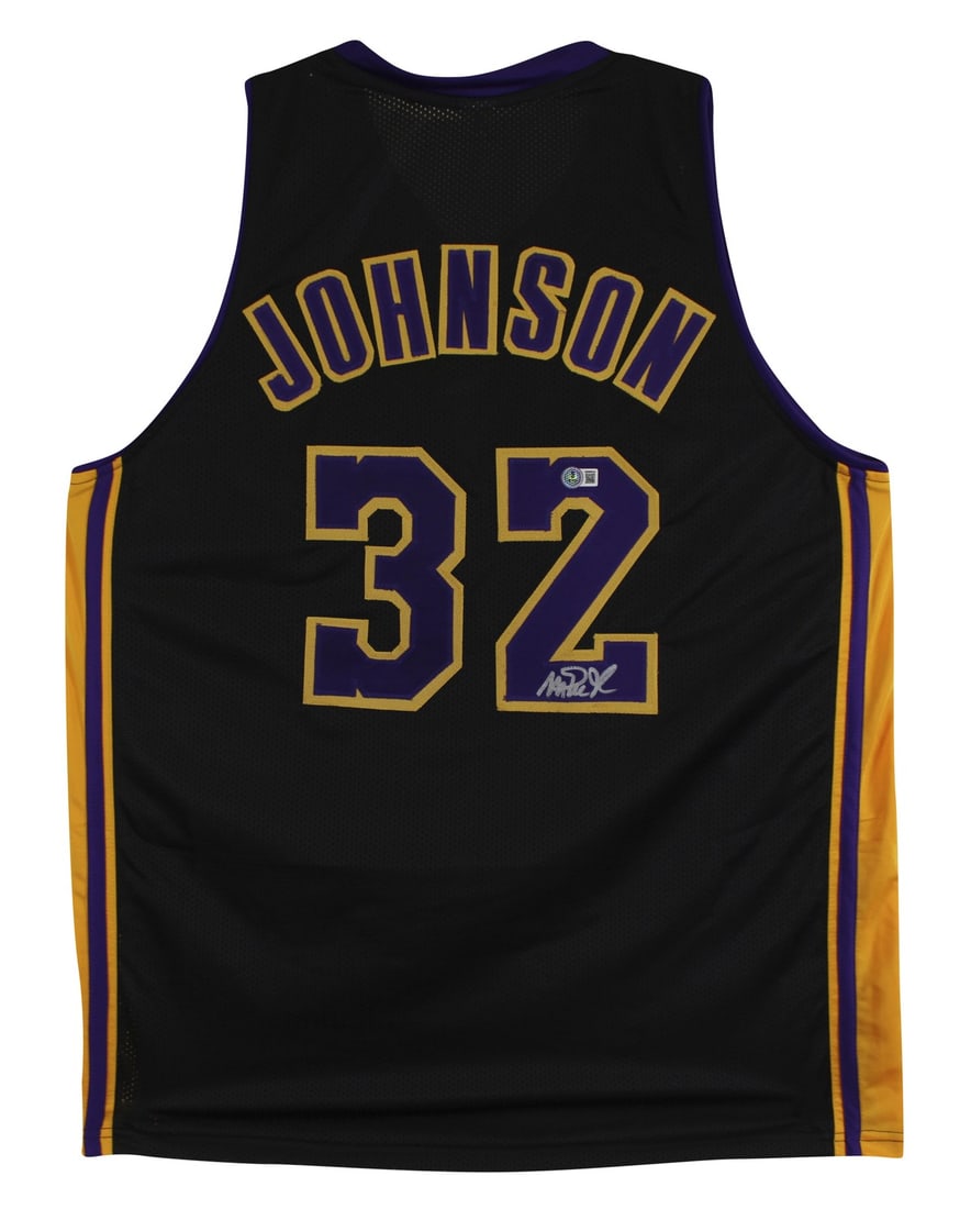 Magic Johnson Autographed Black Pro Jersey Los Angeles Lakers BAS Witnessed: Magic Johnson Autographed Black Pro Jersey Los Angeles Lakers BAS Witnessed This black pro style jersey, featuring striking purple numbers, is personally signed by Magic Johnson, a legendary player of