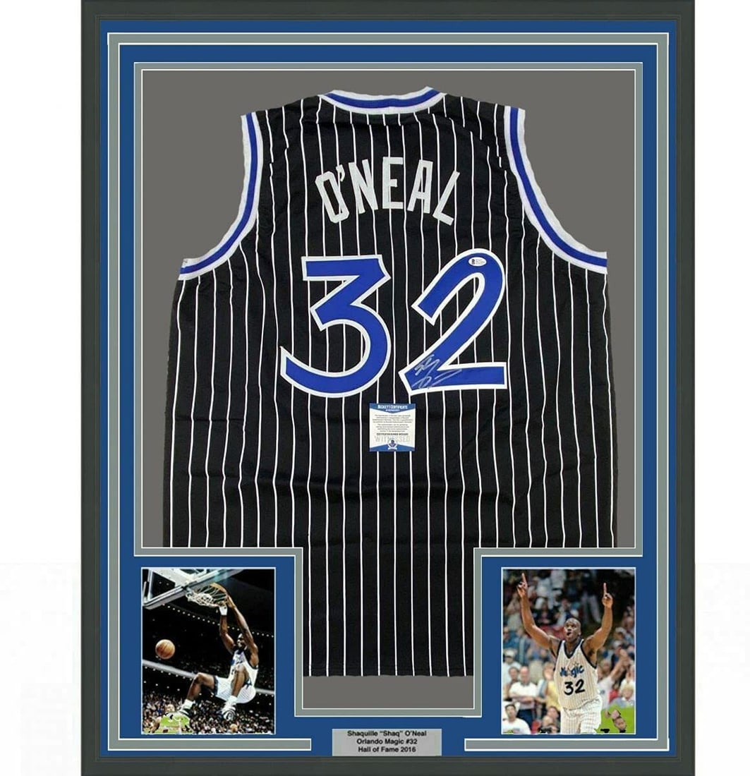 Shaquille O'Neal Signed Orlando Magic Jersey Framed With BAS Authentication 33x42: Shaquille O'Neal Signed Orlando Magic Jersey Framed With BAS Authentication 33x42 This professionally framed and matted Shaquille O'Neal Orlando Magic black jersey features Shaquille O'Neal's autograp