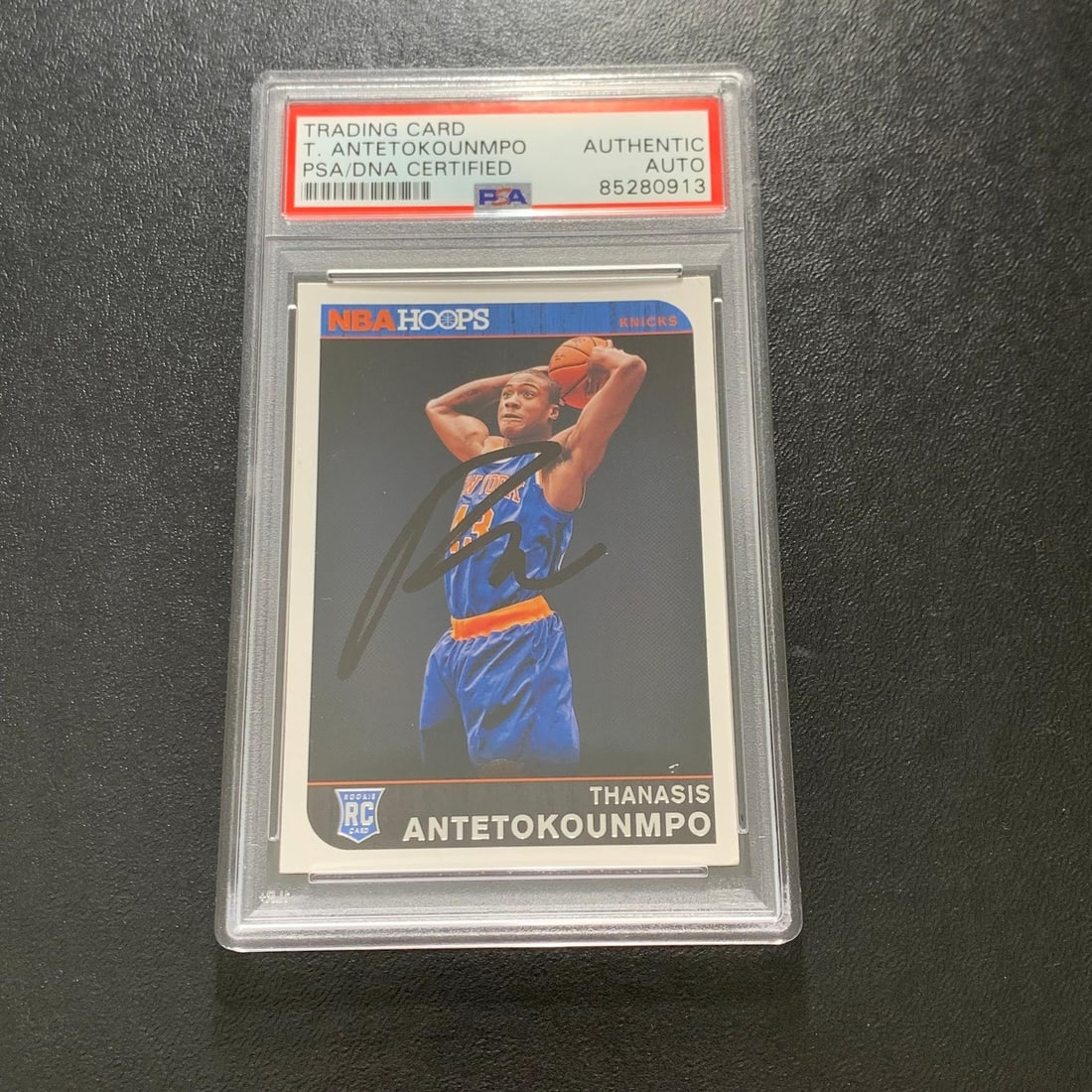2014-15 Panini Hoops #300 Thanasis Antetokounmpo Signed Card PSA/DNA Authenticated: 2014-15 Panini Hoops #300 Thanasis Antetokounmpo Signed Card PSA/DNA Authenticated This collectible features a 2014-15 Panini Hoops #300 card signed by Thanasis Antetokounmpo, showcasing his authentic