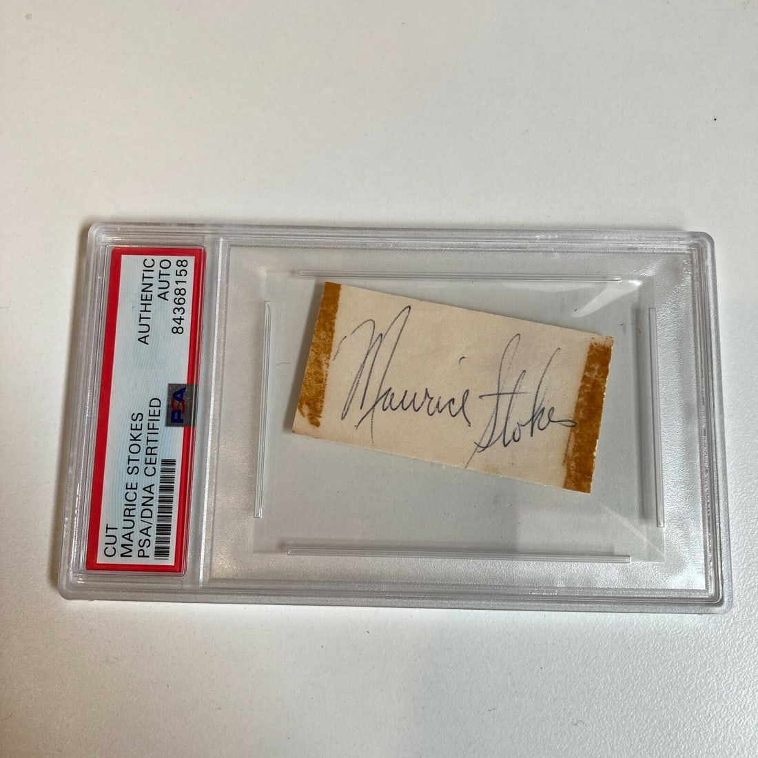 Maurice Stokes Dec 1970 Signed Cut Autograph PSA DNA NBA Hall Of Fame: Maurice Stokes Dec 1970 Signed Cut Autograph PSA DNA NBA Hall Of Fame This item features a signed cut autograph of Maurice Stokes, dated December 1970, authenticated by Professional Sports Authenticat