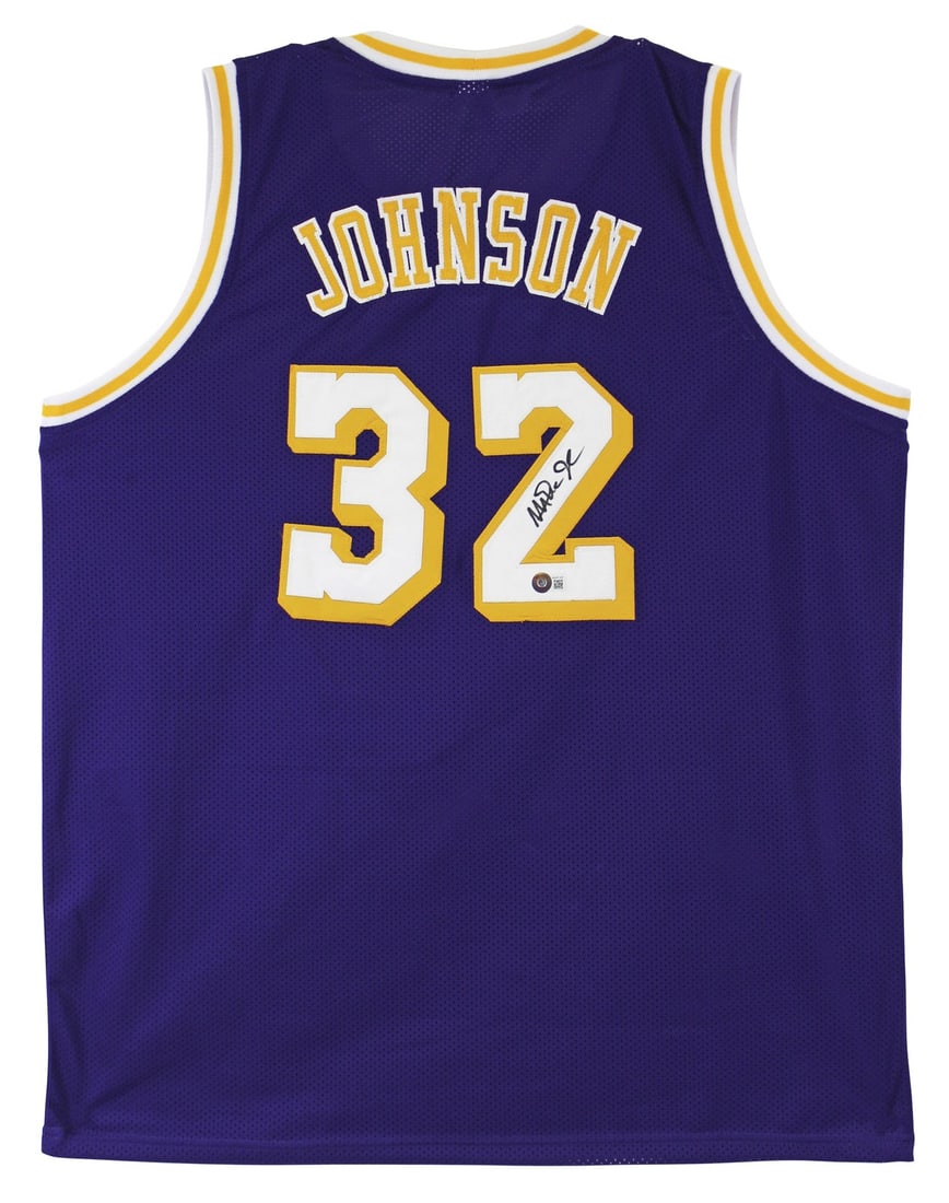 Magic Johnson Signed Purple Basketball Jersey BAS Witness Los Angeles Lakers: Magic Johnson Signed Purple Basketball Jersey BAS Witness Los Angeles Lakers This purple pro style jersey has been personally signed by Magic Johnson of the Los Angeles Lakers. The autograph is authen