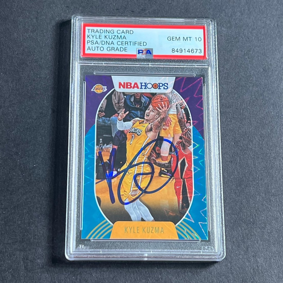 2020-21 NBA Hoops Kyle Kuzma Signed Card PSA Authenticated Lakers: 2020-21 NBA Hoops Kyle Kuzma Signed Card PSA Authenticated Lakers This 2020-21 NBA Hoops #23 card features the signature of Kyle Kuzma, a talented player from the Los Angeles Lakers. The autograph is 