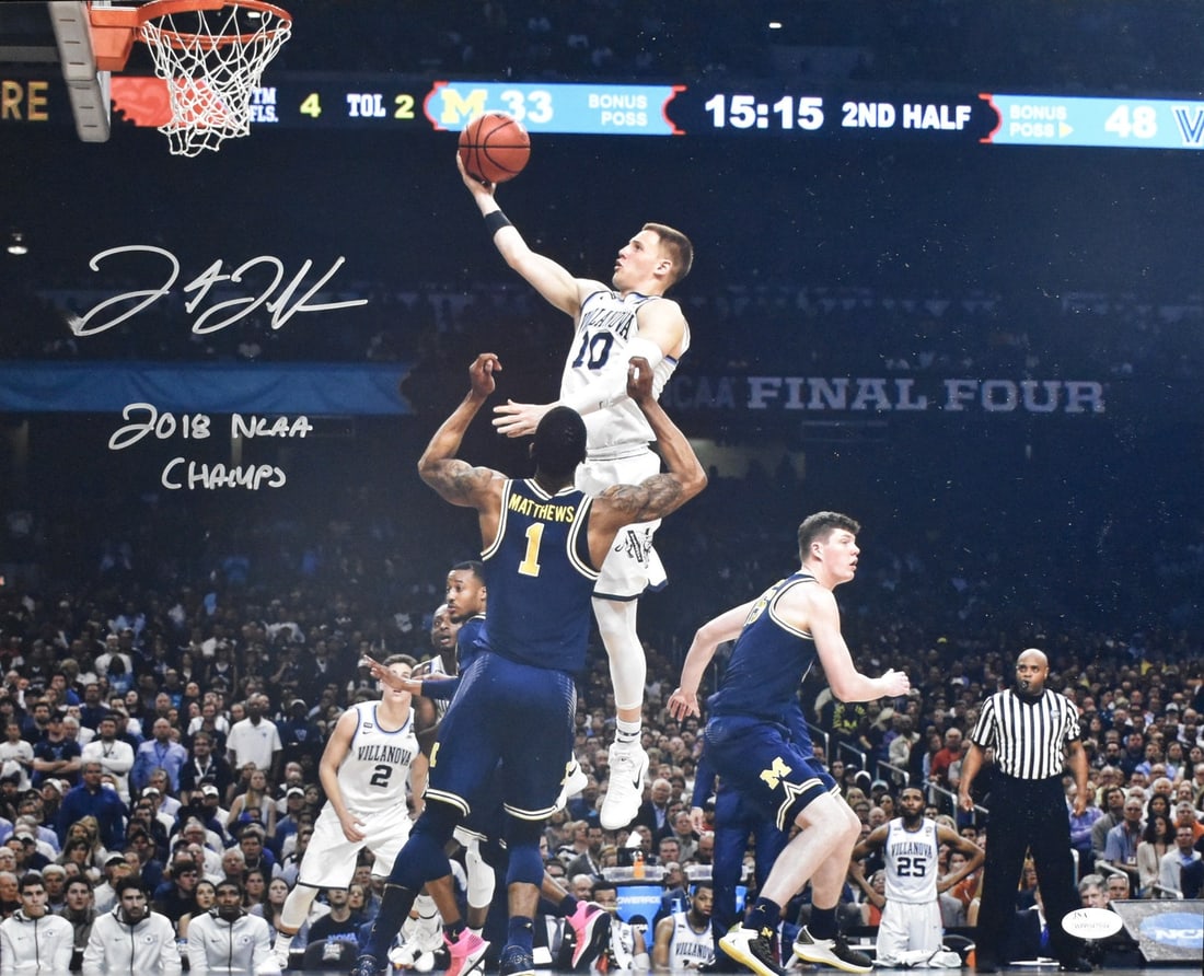 Donte DiVincenzo Signed Villanova 16x20 Photo With 2018 NCAA Champs Inscription JSA: Donte DiVincenzo Signed Villanova 16x20 Photo With 2018 NCAA Champs Inscription JSA This 16x20 photo features Donte DiVincenzo of the Villanova Wildcats, autographed and inscribed with "2018 NCAA Cham
