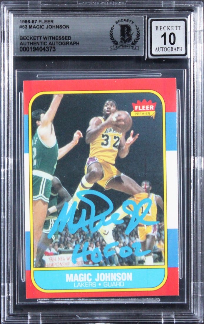 Magic Johnson Autographed 1986 Fleer Card With HOF 02 Inscription Beckett Slabbed: Magic Johnson Autographed 1986 Fleer Card With HOF 02 Inscription Beckett Slabbed This is an original 1986 Fleer #53 basketball trading card personally signed by Magic Johnson of the Los Angeles Laker