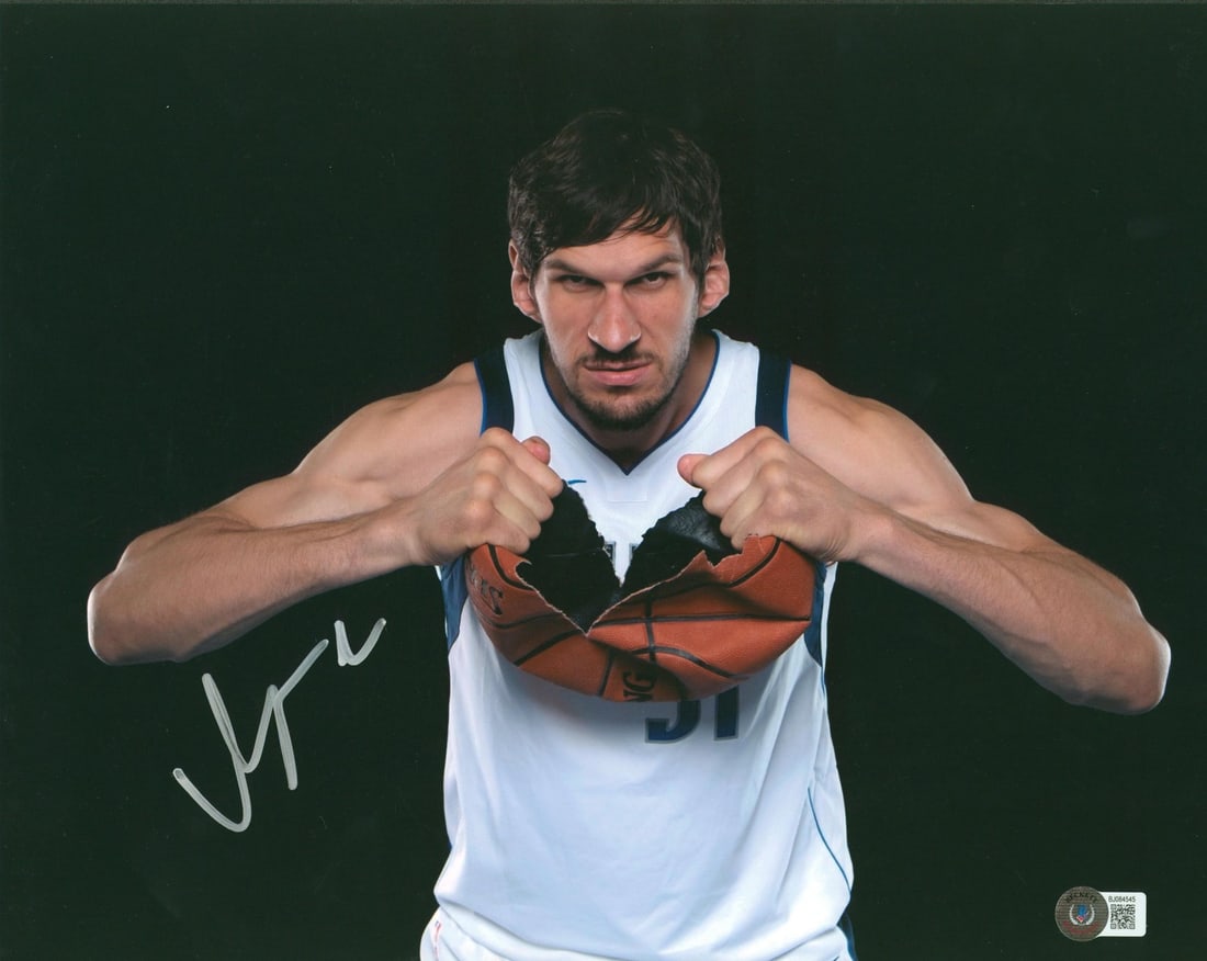 Dallas Mavericks Boban Marjanovic Signed 11x14 Photo BAS Certified: Dallas Mavericks Boban Marjanovic Signed 11x14 Photo BAS Certified This authentic 11x14 photo features Boban Marjanovic, signed personally by the Dallas Mavericks player. The item is verified as origi