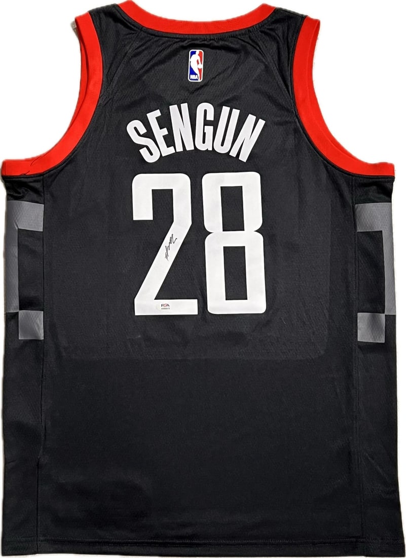 Alperen Segun Autographed Houston Rockets Jersey PSA/DNA Certified: Alperen Segun Autographed Houston Rockets Jersey PSA/DNA Certified This authentic stitched jersey features the signature of Alperen Segun, a rising star of the Houston Rockets. The autograph has been 