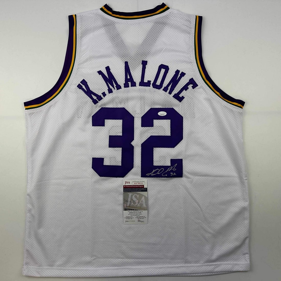 Autographed Karl Malone Utah Jazz Retro Jersey JSA COA: Autographed Karl Malone Utah Jazz Retro Jersey JSA COA Celebrate the legacy of Karl Malone with this autographed white retro basketball jersey from the Utah Jazz. This unique piece features Malone's n