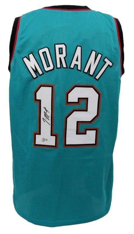 Teal Vancouver Custom Basketball Jersey Signed by Ja Morant Beckett Authenticated: Teal Vancouver Custom Basketball Jersey Signed by Ja Morant Beckett Authenticated This is a Ja Morant autographed teal custom basketball jersey from the Vancouver team, featuring the size XL. The jers