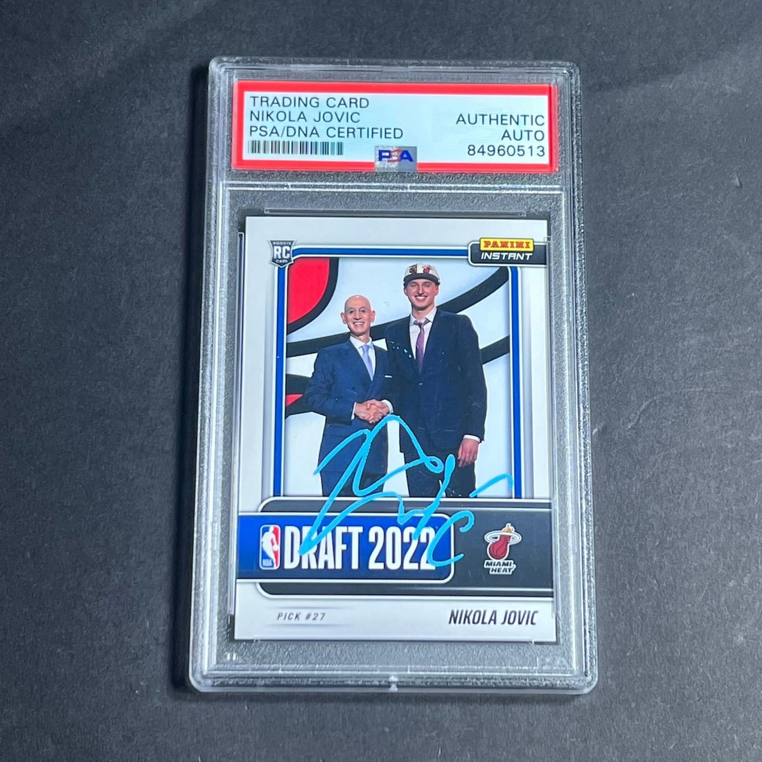 2022-2023 Panini Instant Nikola Jovic Signed Card PSA Authenticated Miami Heat: 2022-2023 Panini Instant Nikola Jovic Signed Card PSA Authenticated Miami Heat Up for auction is a 2022-2023 Panini Instant #DN 22 trading card, signed by Nikola Jovic of the Miami Heat. This card fea