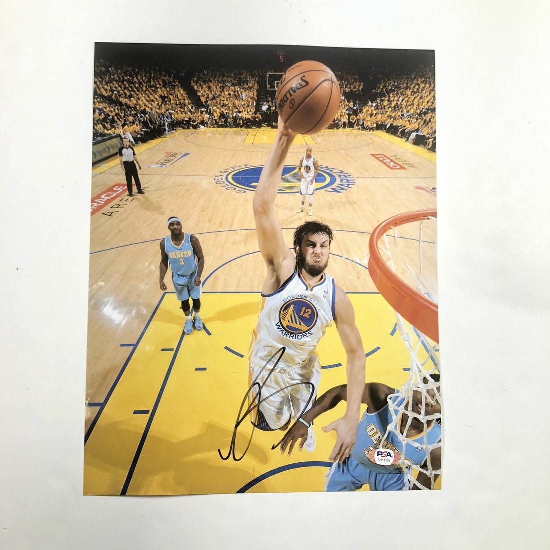 Andrew Bogut Autographed 11x14 Warriors Photo PSA DNA Authenticated: Andrew Bogut Autographed 11x14 Warriors Photo PSA DNA Authenticated This is a professionally printed 11x14 photograph featuring Andrew Bogut, who played for the Golden State Warriors. The photo has be