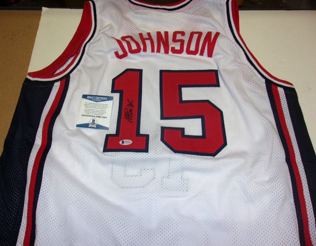 Signed Magic Johnson Basketball Jersey with COA Lakers Dream Team: Signed Magic Johnson Basketball Jersey with COA Lakers Dream Team This is a pre-owned Los Angeles Lakers and Olympic Dream Team jersey signed by Magic Johnson. The jersey is an original item and comes