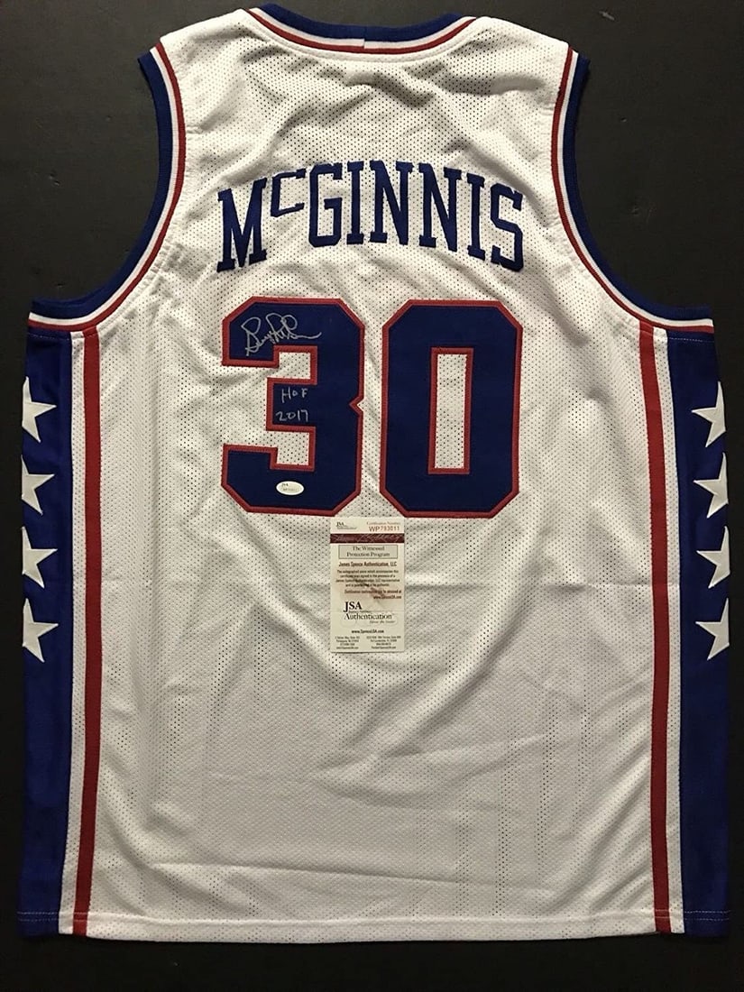 George McGinnis Autographed Philadelphia 76ers Jersey JSA Certified Gem Mint: George McGinnis Autographed Philadelphia 76ers Jersey JSA Certified Gem Mint This is an original autographed George McGinnis Philadelphia 76ers white jersey, featuring the Hall of Fame designation and