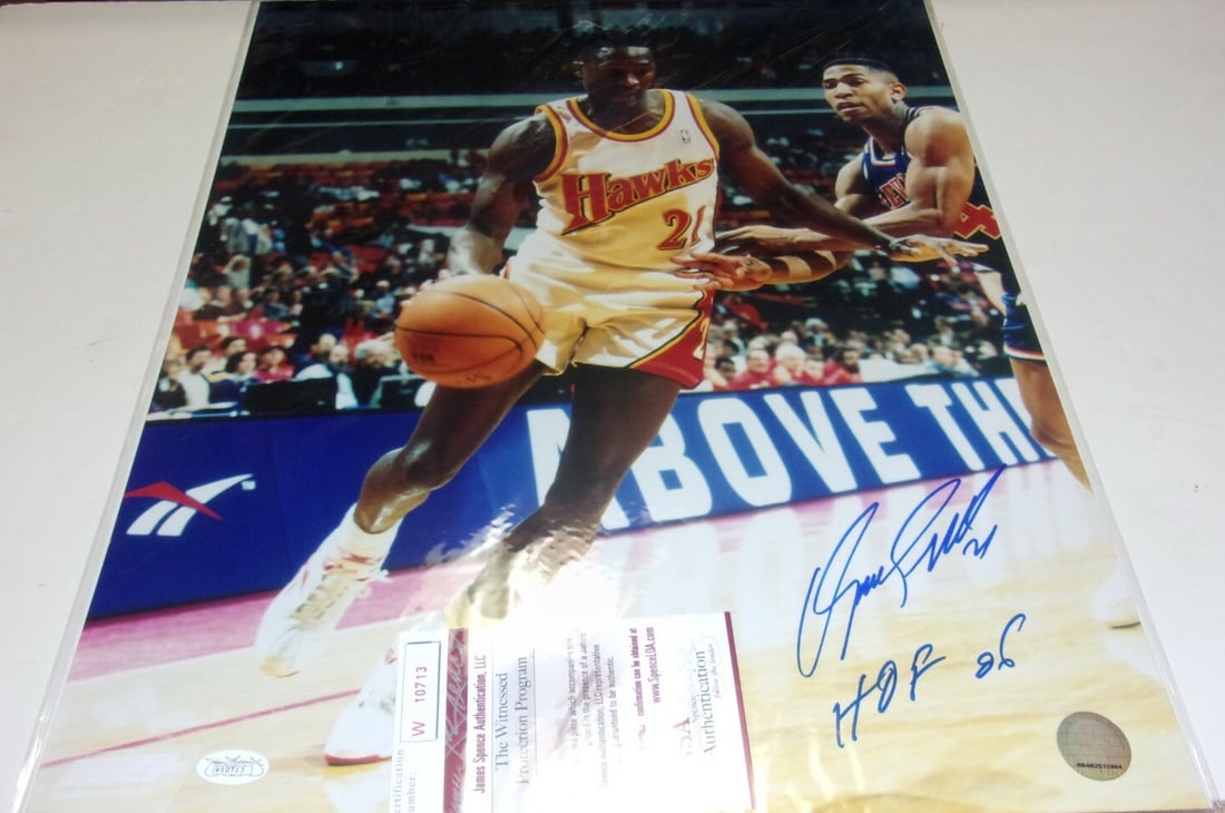 Autographed 16x20 Dominique Wilkins Photograph With JSA COA Atlanta Hawks HOF 2006: Autographed 16x20 Dominique Wilkins Photograph With JSA COA Atlanta Hawks HOF 2006 This is a pre-owned 16x20 photograph signed by Dominique Wilkins, commemorating his career with the Atlanta Hawks. Th
