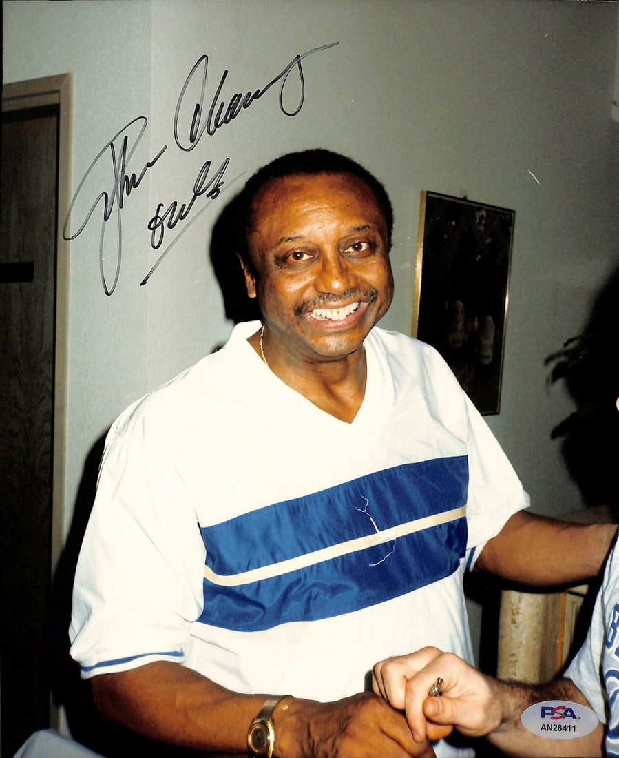 John Chaney Autographed 8x10 Basketball Photo Owls PSA/DNA: John Chaney Autographed 8x10 Basketball Photo Owls PSA/DNA This is an original 8x10 photograph of John Chaney, the esteemed basketball coach. The photo is autographed and inscribed with "Owls," celebr