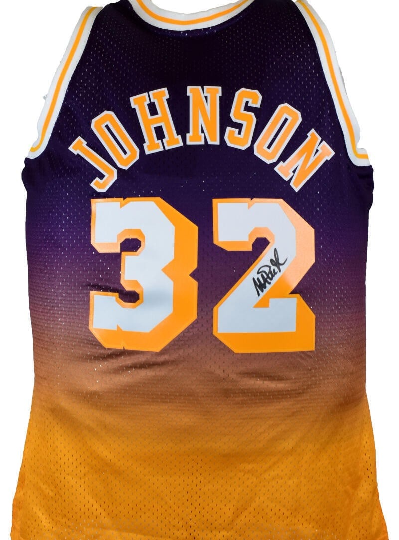 Signed Los Angeles Lakers Magic Johnson Purple Swingman Jersey BAS: Signed Los Angeles Lakers Magic Johnson Purple Swingman Jersey BAS This is a pre-owned Los Angeles Lakers purple Mitchell & Ness Swingman jersey, personally signed by Magic Johnson. The autograph has 