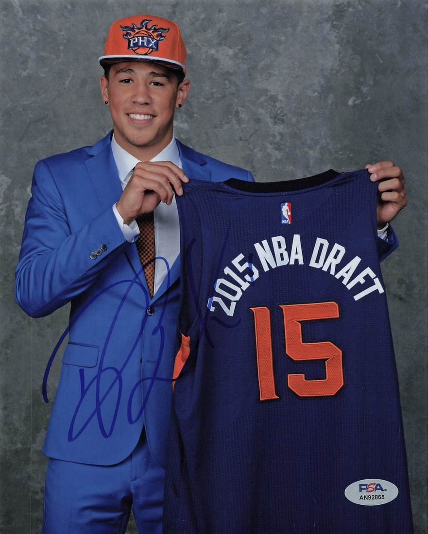 Devin Booker Phoenix Suns 8x10 Signed Photo PSA DNA: Devin Booker Phoenix Suns 8x10 Signed Photo PSA DNA This is a professionally printed 8x10 photograph signed by Devin Booker of the Phoenix Suns. The autograph has been authenticated by PSA/DNA, ensuri