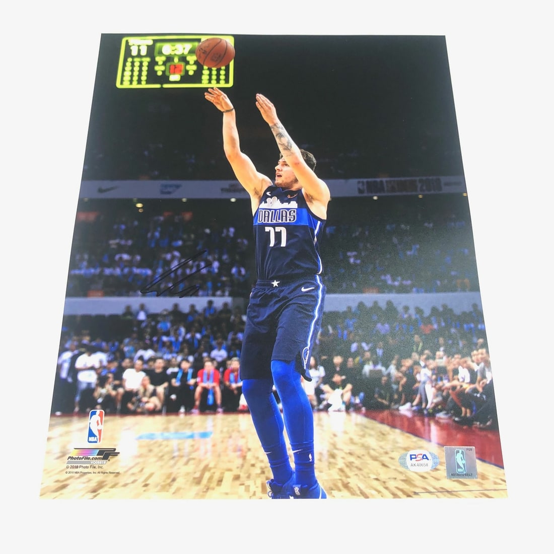 Luka Doncic Autographed 11x14 Photo PSA/DNA Dallas Mavericks: Luka Doncic Autographed 11x14 Photo PSA/DNA Dallas Mavericks Celebrate your love for the Dallas Mavericks with this stunning 11x14 photograph signed by star player Luka Doncic. This original, professi