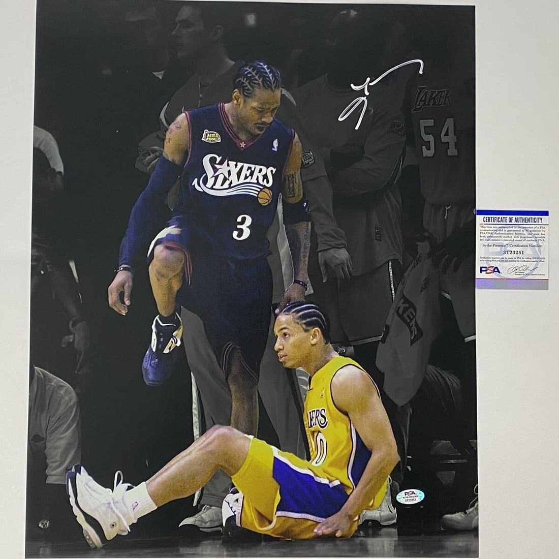 Signed Allen Iverson 16x20 Step-Over Photo with PSA/DNA COA: Signed Allen Iverson 16x20 Step-Over Photo with PSA/DNA COA This is an original autographed 16x20 photo of Allen Iverson capturing his iconic Spotlight Step-Over moment. The autograph is authenticated