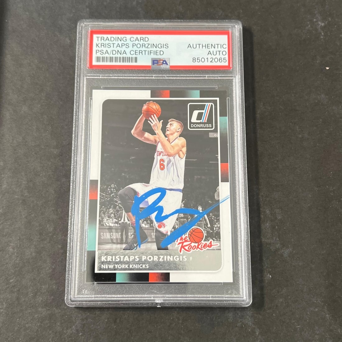 2015-16 Panini Donruss Kristaps Porzingis Signed Rookie Card PSA Authenticated: 2015-16 Panini Donruss Kristaps Porzingis Signed Rookie Card PSA Authenticated For collectors of basketball memorabilia, this 2015-16 Panini Donruss #32 card features a signature from Kristaps Porzing