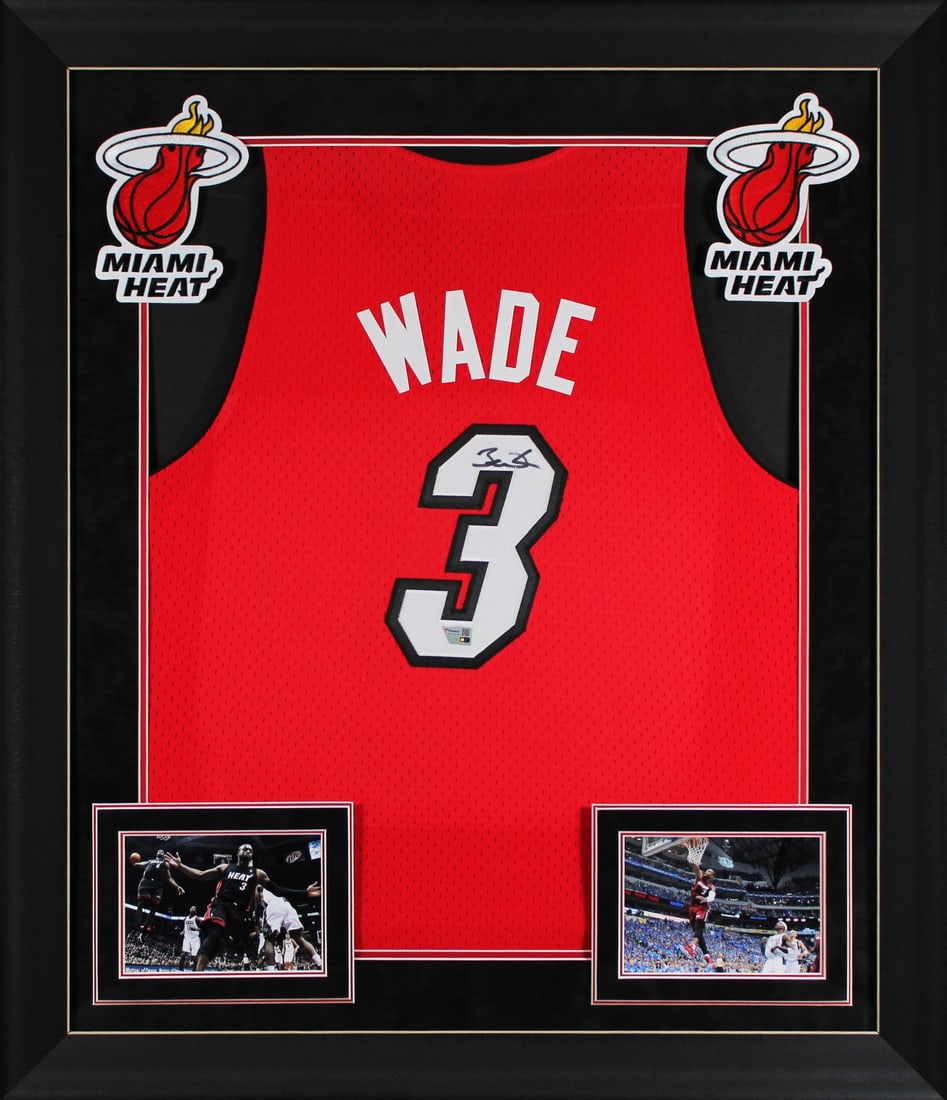 Framed 2005-06 Mitchell & Ness Dwyane Wade Signed Miami Red Jersey Fanatics Authenticated: Framed 2005-06 Mitchell & Ness Dwyane Wade Signed Miami Red Jersey Fanatics Authenticated This framed 2005-06 red Mitchell & Ness Hardwood Classics Swingman jersey has been personally signed by Dwyane