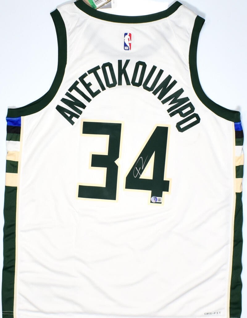 Giannis Antetokounmpo autographed Milwaukee Bucks white Swingman jersey Beckett: Giannis Antetokounmpo autographed Milwaukee Bucks white Swingman jersey Beckett This Milwaukee Bucks 2022-2023 white Swingman Association jersey is personally signed by Giannis Antetokounmpo. The jers