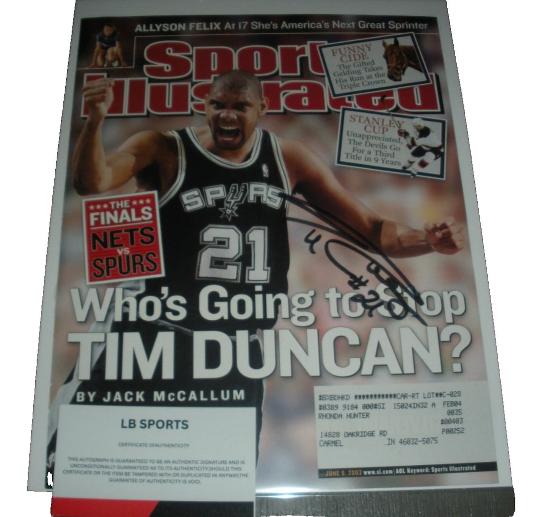 Signed Sports Illustrated Cover Tim Duncan With COA: Signed Sports Illustrated Cover Tim Duncan With COA This is an original Sports Illustrated magazine cover featuring Tim Duncan of the San Antonio Spurs. The cover is signed and comes with a certificat