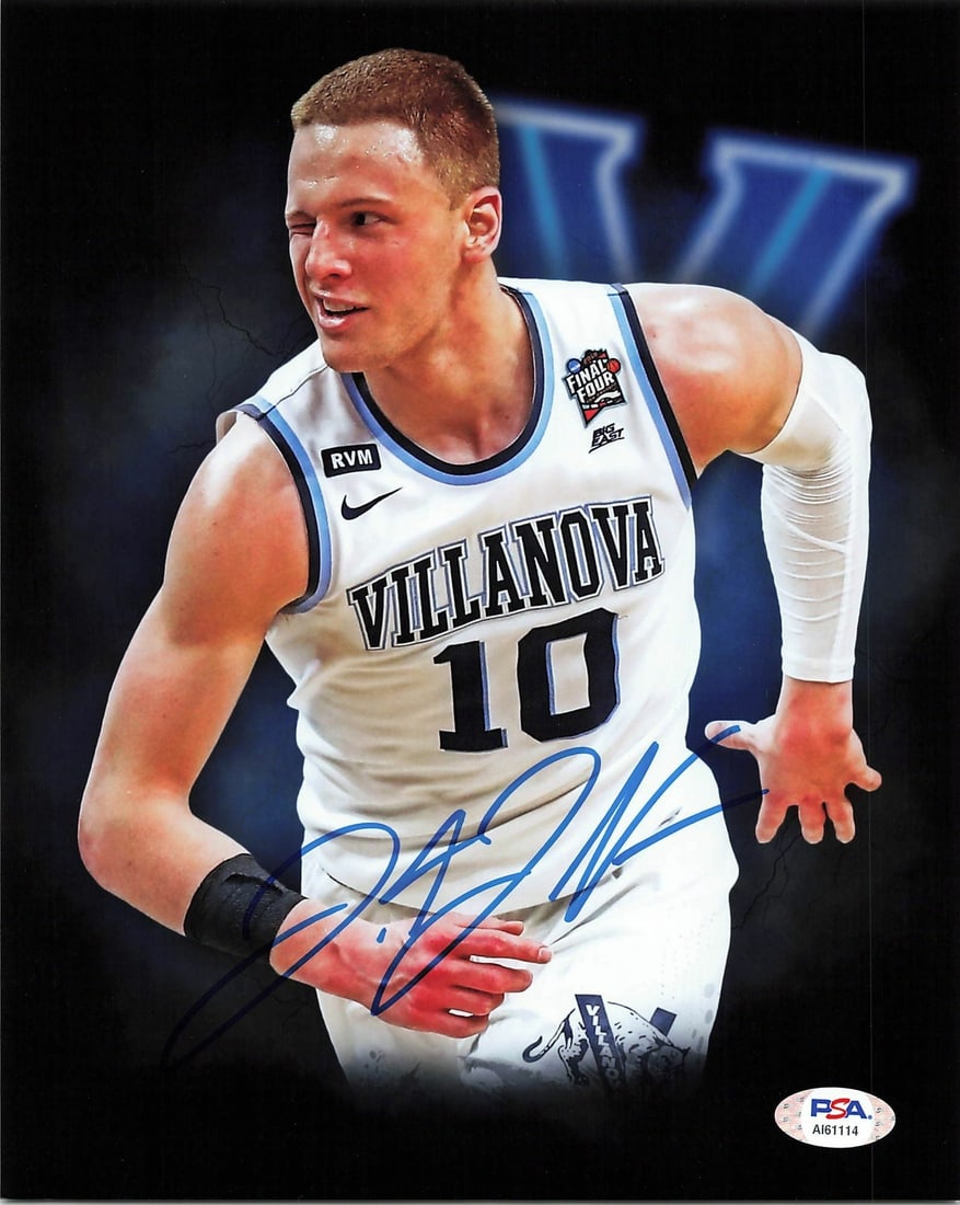 Donte Divincenzo Autographed 8x10 Photo PSA/DNA Milwaukee Bucks: Donte Divincenzo Autographed 8x10 Photo PSA/DNA Milwaukee Bucks This is an original 8x10 photograph signed by Donte Divincenzo, a notable player for the Milwaukee Bucks and Villanova. The autograph ha