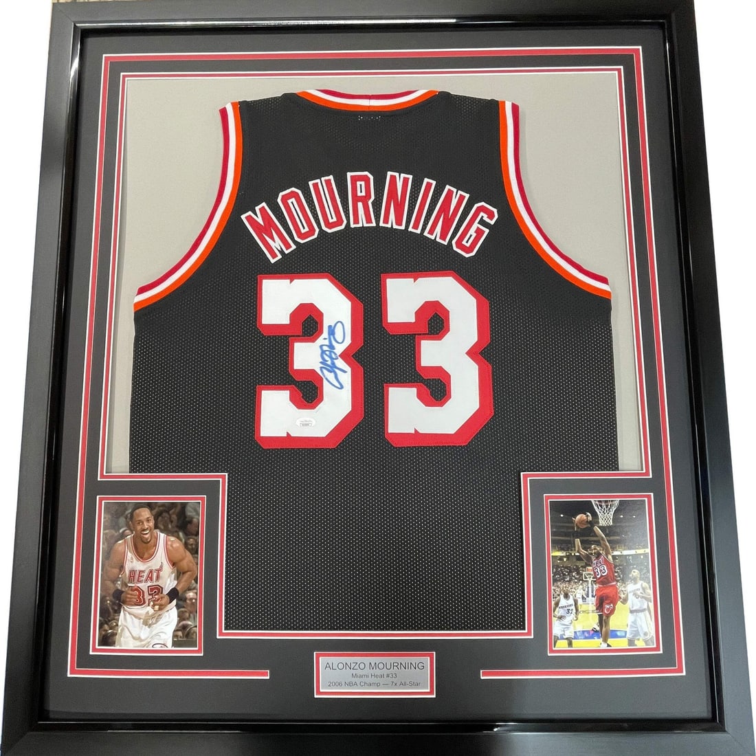 Framed Autographed Alonzo Mourning Miami Heat Jersey JSA COA 33x42: Framed Autographed Alonzo Mourning Miami Heat Jersey JSA COA 33x42 Celebrate the legacy of Alonzo Mourning with this professionally framed autographed Miami Heat jersey. This stunning piece features a