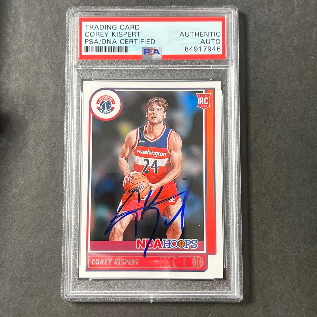 Corey Kispert Autographed 2021 NBA Hoops 212 Card PSA Authenticated Wizards: Corey Kispert Autographed 2021 NBA Hoops 212 Card PSA Authenticated Wizards This is a 2021 Panini NBA Hoops #212 trading card featuring Corey Kispert of the Washington Wizards. The card is signed by C