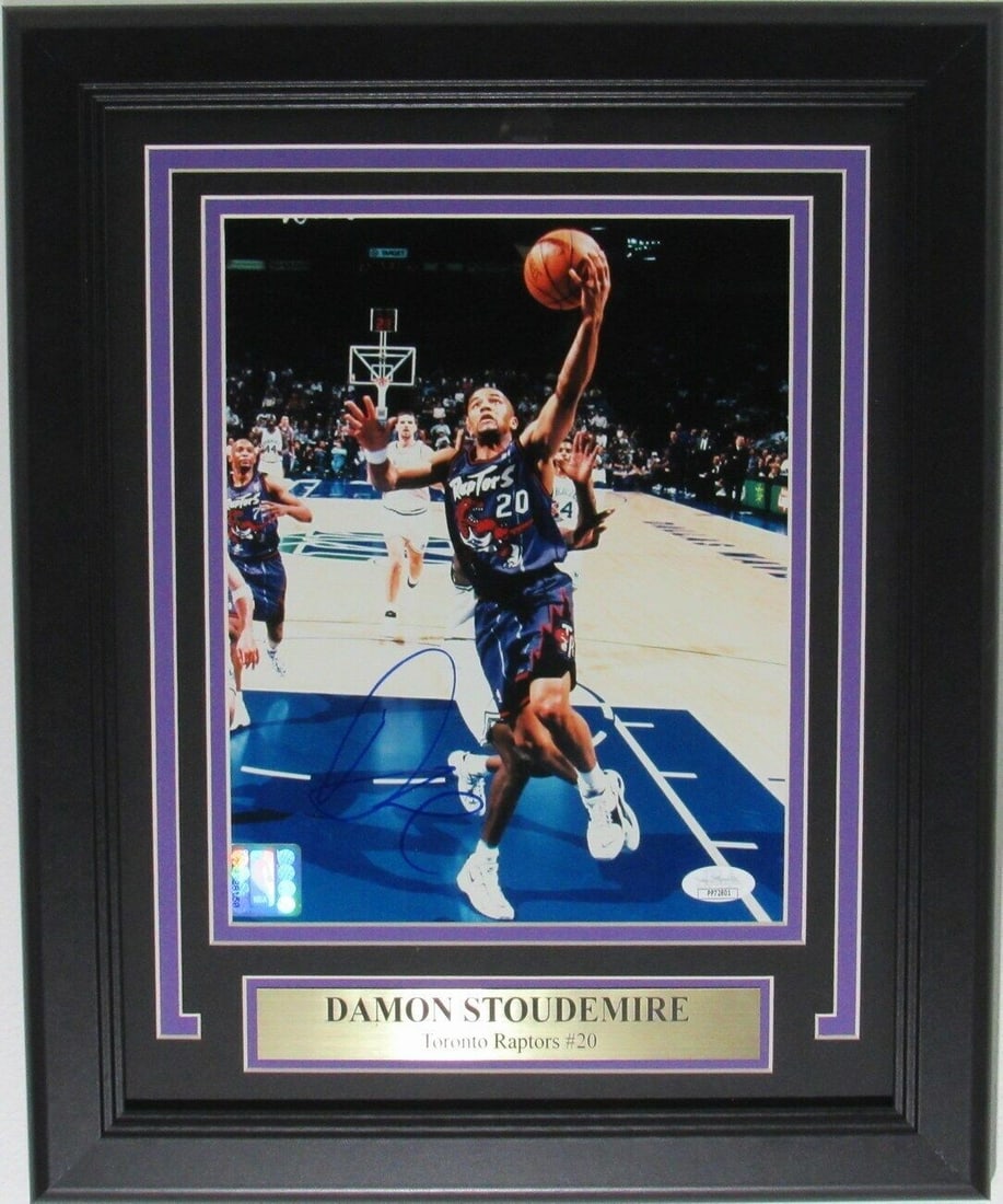 Framed 8x10 Photo Damon Stoudamire Autograph Toronto Raptors with JSA COA: Framed 8x10 Photo Damon Stoudamire Autograph Toronto Raptors with JSA COA This is a beautifully framed 8x10 photo of Damon Stoudamire, a celebrated player of the Toronto Raptors, featuring his authent