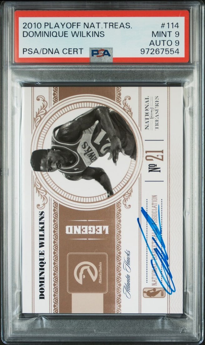 2010 Panini National Treasures Dominique Wilkins Signed Card AUTO 9 PSA 114: 2010 Panini National Treasures Dominique Wilkins Signed Card AUTO 9 PSA 114 This is a 2010 Playoff National Treasures Dominique Wilkins #114 signed sports trading card. The card features the autograph