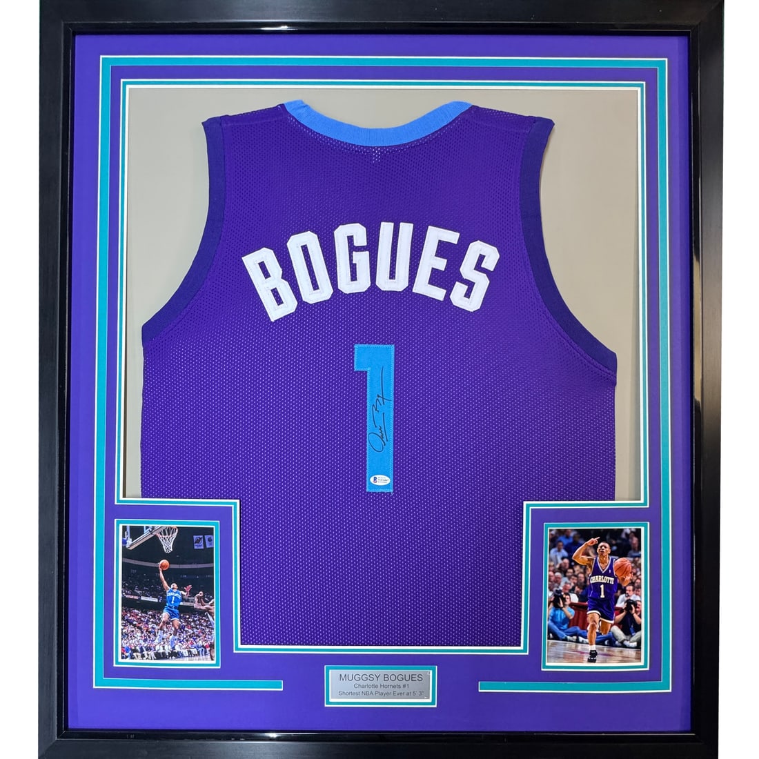 Framed Muggsy Bogues Autographed Charlotte Hornets Jersey BAS COA 33x42: Framed Muggsy Bogues Autographed Charlotte Hornets Jersey BAS COA 33x42 Capture the essence of basketball history with this framed autographed Muggsy Bogues Charlotte Hornets purple jersey. This origi