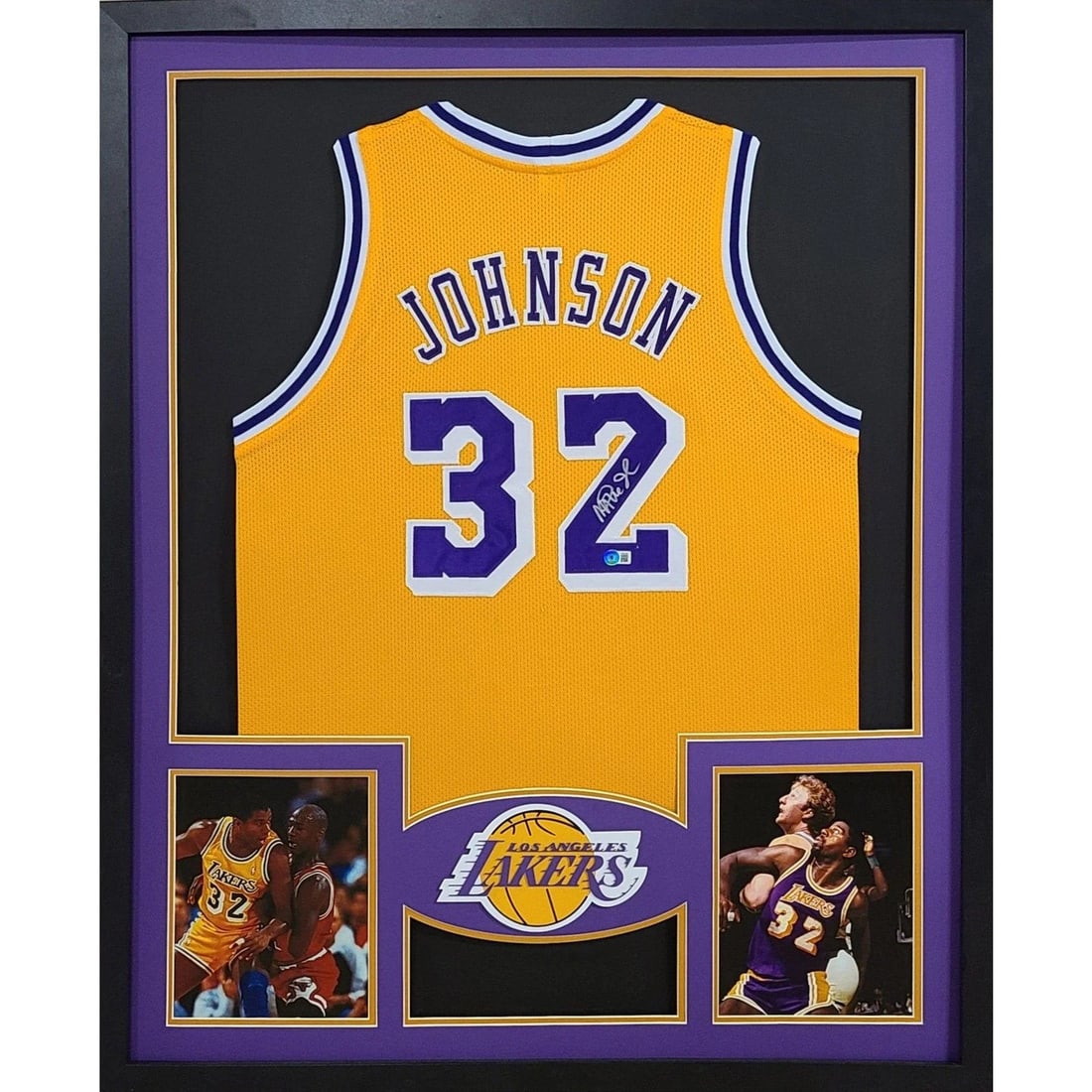 Framed Magic Johnson Autographed Lakers Jersey Beckett BAS: Framed Magic Johnson Autographed Lakers Jersey Beckett BAS This is a framed Los Angeles Lakers jersey autographed by Magic Johnson. The jersey is professionally framed with attention to detail, featur
