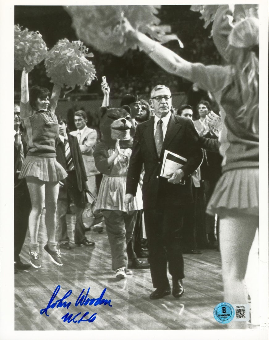 John Wooden Signed UCLA 8x10 Photo with Beckett Authentication: John Wooden Signed UCLA 8x10 Photo with Beckett Authentication This authentic 8x10 photo features the iconic John Wooden, renowned coach of the UCLA Bruins, personally inscribed with "UCLA." The photo