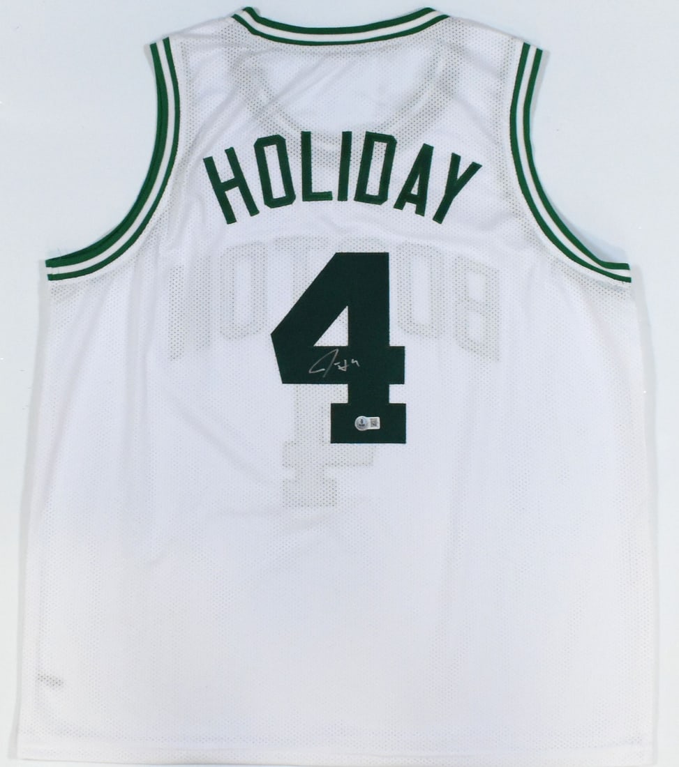 Boston Celtics Jrue Holiday signed white Pro Style jersey Beckett hologram silver: Boston Celtics Jrue Holiday signed white Pro Style jersey Beckett hologram silver This is a white pro style jersey autographed by Jrue Holiday. The jersey represents the Boston Celtics and is an origi