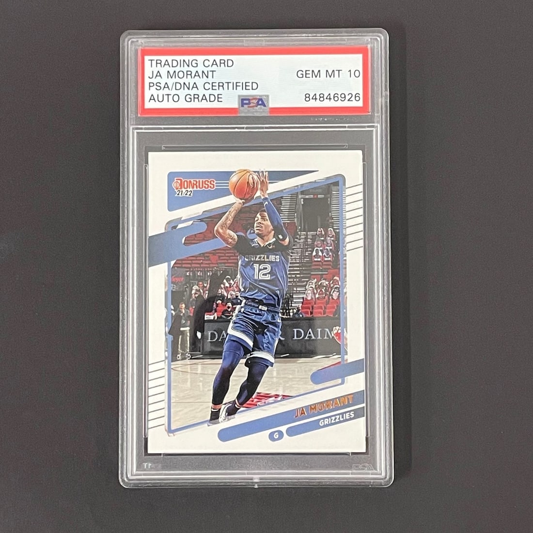 Ja Morant 2021-22 Donruss #76 PSA DNA Auto Graded 10: Ja Morant 2021-22 Donruss #76 PSA DNA Auto Graded 10 This is a 2021-2022 Panini Donruss #76 Ja Morant sports trading card, autographed by Ja Morant. The card has been professionally authenticated and 