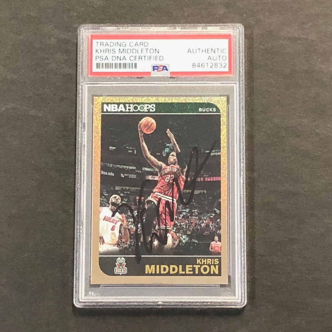 2014-15 NBA Hoops Khris Middleton Signed Card PSA/DNA Authentic Bucks: 2014-15 NBA Hoops Khris Middleton Signed Card PSA/DNA Authentic Bucks This is an original 2014-15 NBA Hoops #140 trading card featuring the signature of Khris Middleton, star player of the Milwaukee B