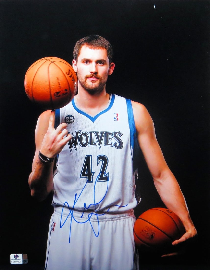 Kevin Love Autographed 11X14 Photo Timberwolves GAI Authenticated: Kevin Love Autographed 11X14 Photo Timberwolves GAI Authenticated This is an original 11X14 photo of Kevin Love, a prominent player from the Minnesota Timberwolves, featuring his autograph. The photo 